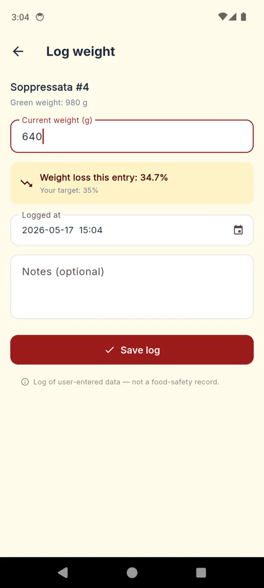 The log weight screen showing a 640 gram reading working out to 34.7 percent loss against a 35 percent target, with the not-a-food-safety-record notice below the save button