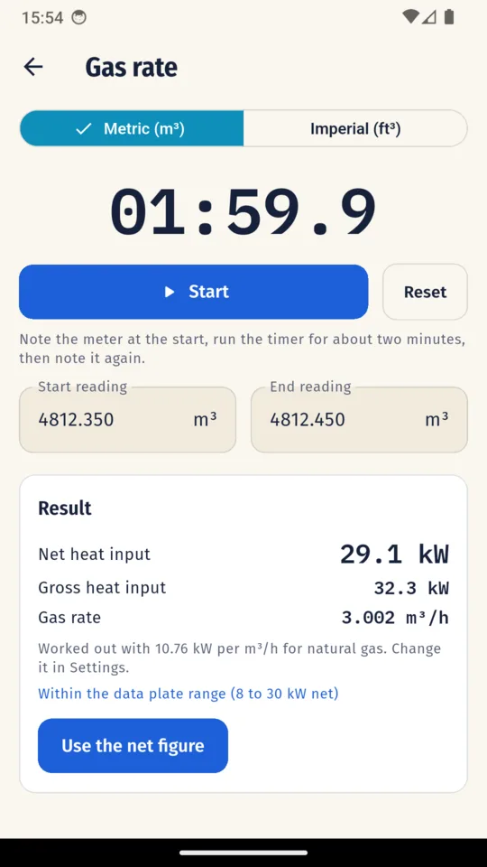The CP12 Pro gas rate timer showing net and gross heat input against the data plate range