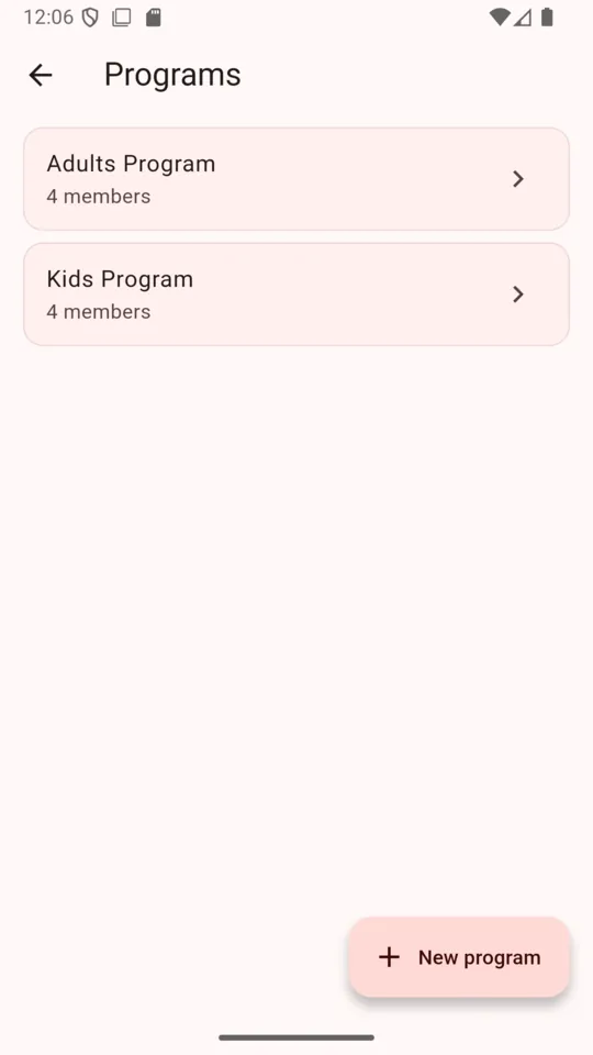 The DojoDues programs screen listing an Adults Program and a Kids Program with four members each