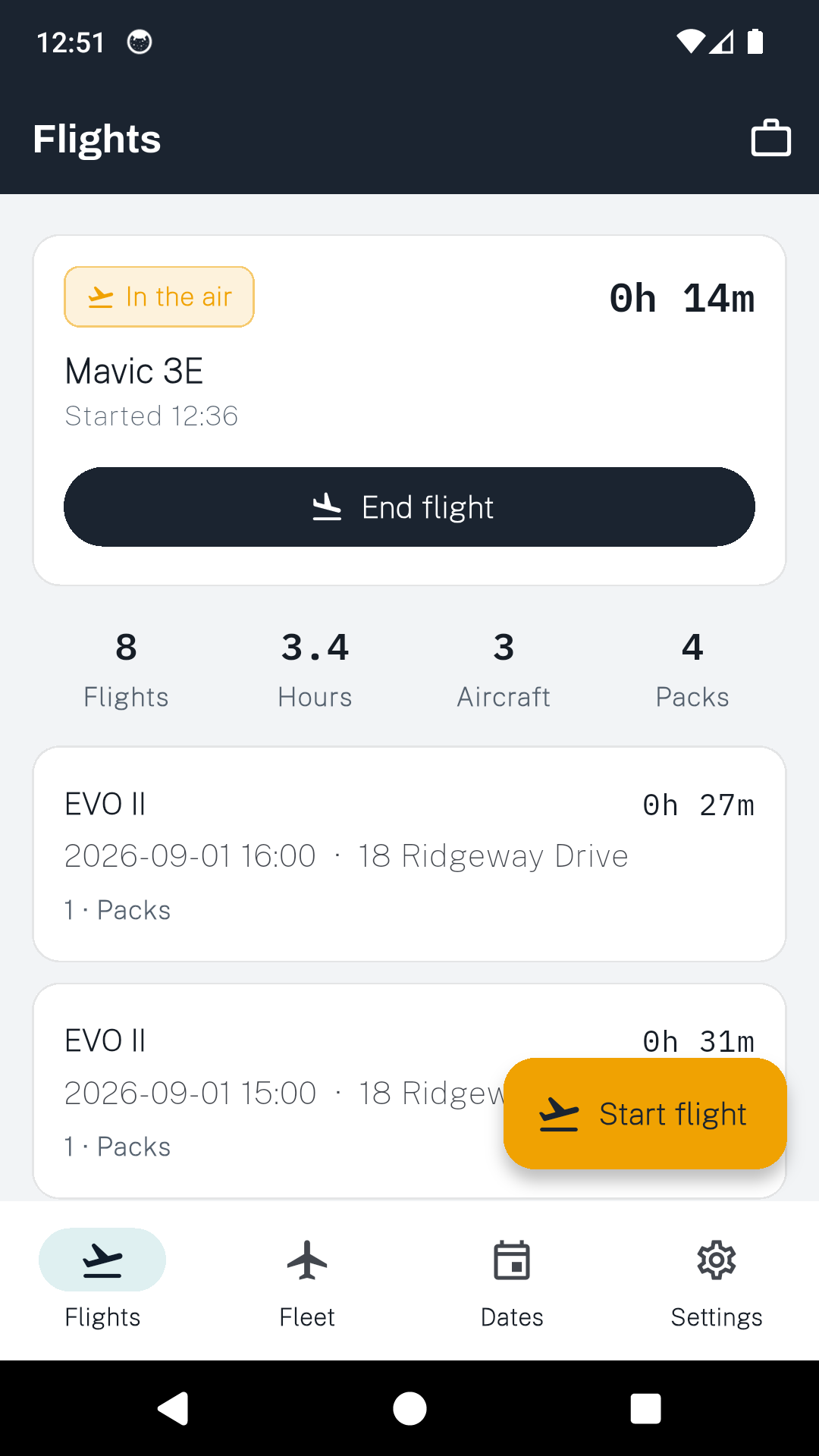 The DroneLog 107 flights screen with an aircraft in the air at fourteen minutes, above totals for flights, hours, aircraft and packs.