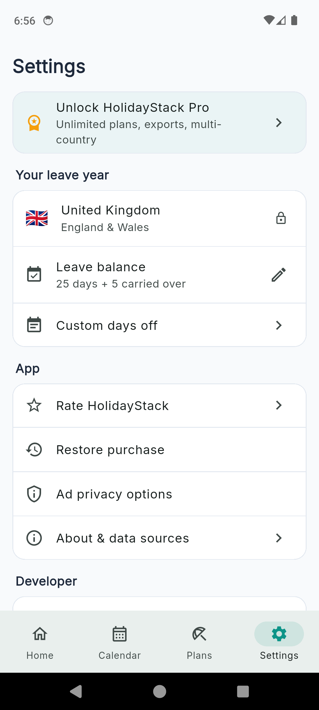 HolidayStack settings showing the United Kingdom England and Wales region, leave balance with carried-over days, custom days off and app options