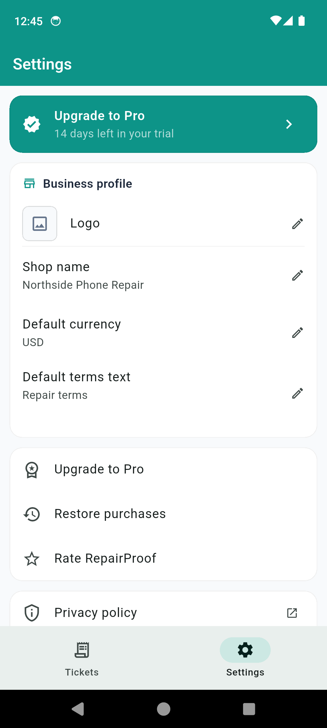 RepairProof settings showing business profile, shop name, default currency and editable default terms text