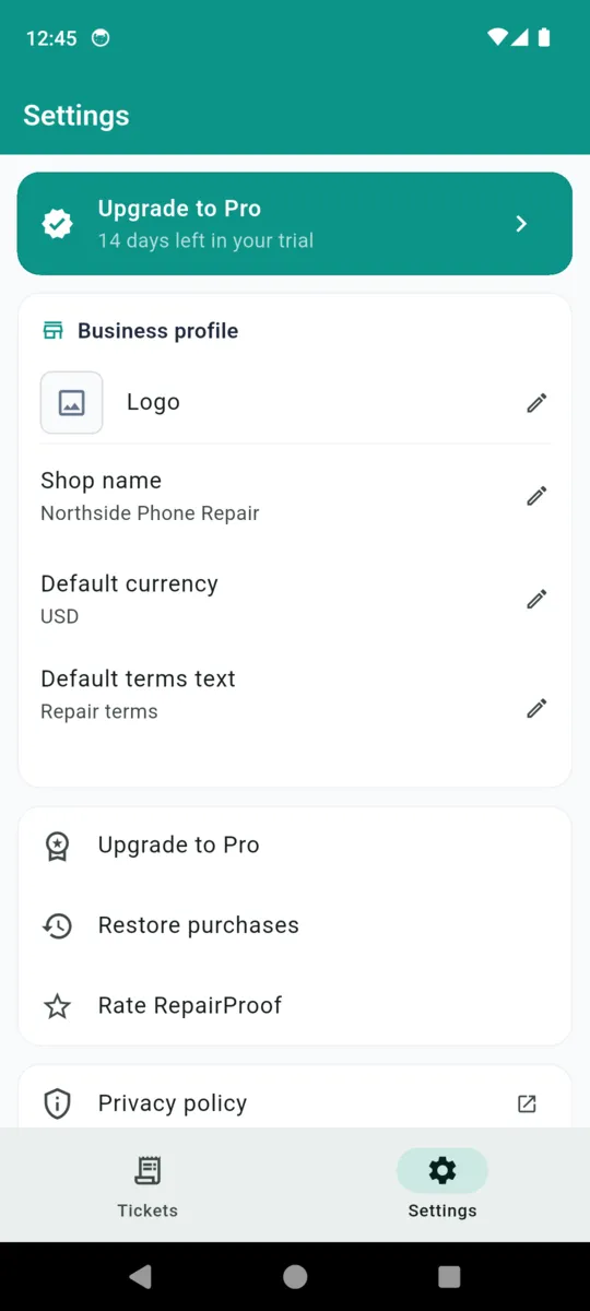 RepairProof settings showing the business profile: shop logo, shop name, default currency and default terms text