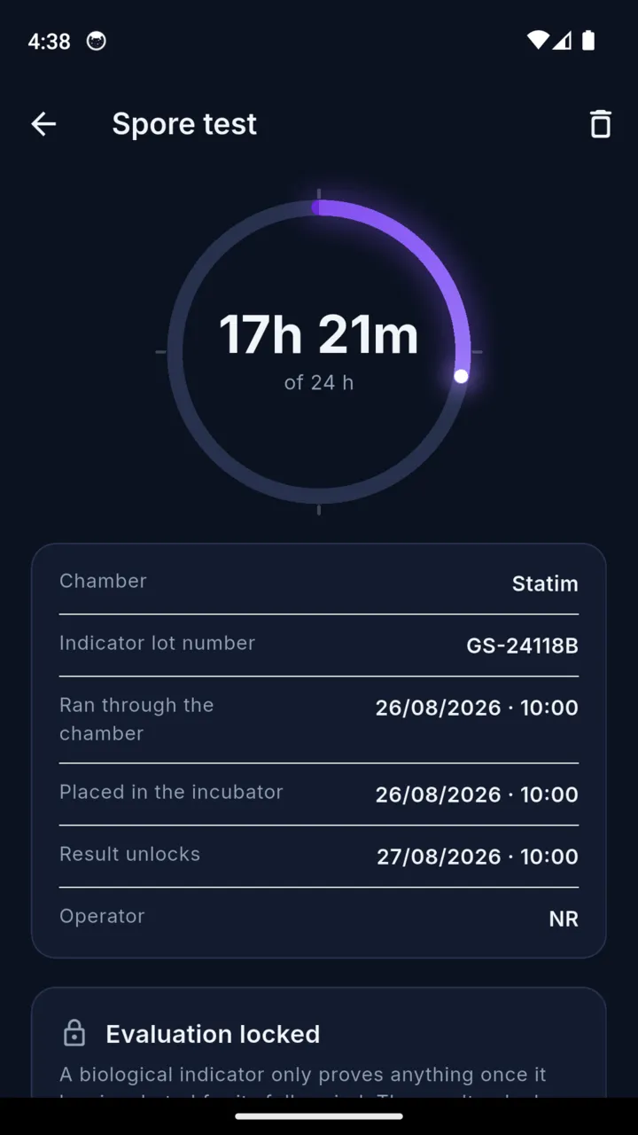 A SteriProof spore test showing a countdown ring reading 17 hours 58 minutes of 24, the chamber, indicator lot number and the time the result unlocks, with an Evaluation locked panel below