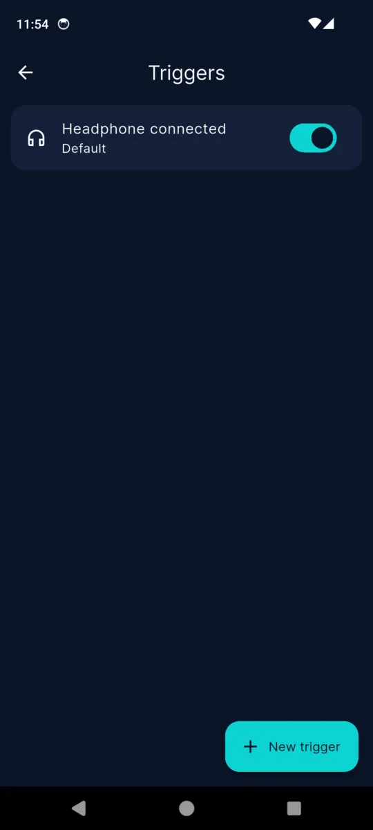 The VolumeMate triggers screen with one enabled trigger that applies the Default profile when headphones are connected